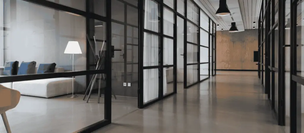 Interior workspace fitted with stylish partitions and installed SPC flooring