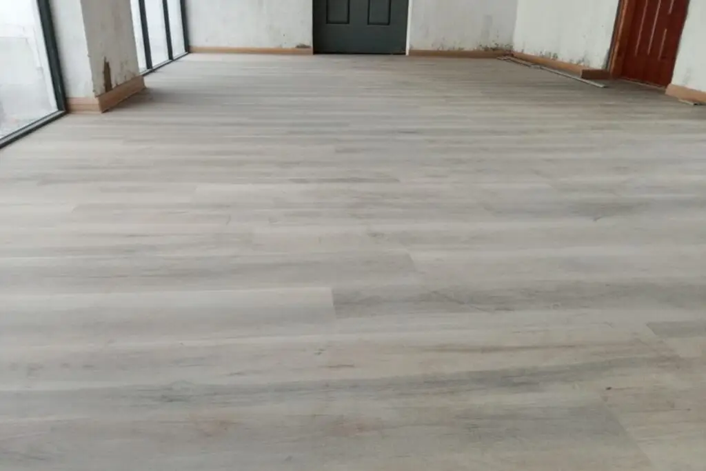 Completed SPC flooring installation showing seamless and uniform surface