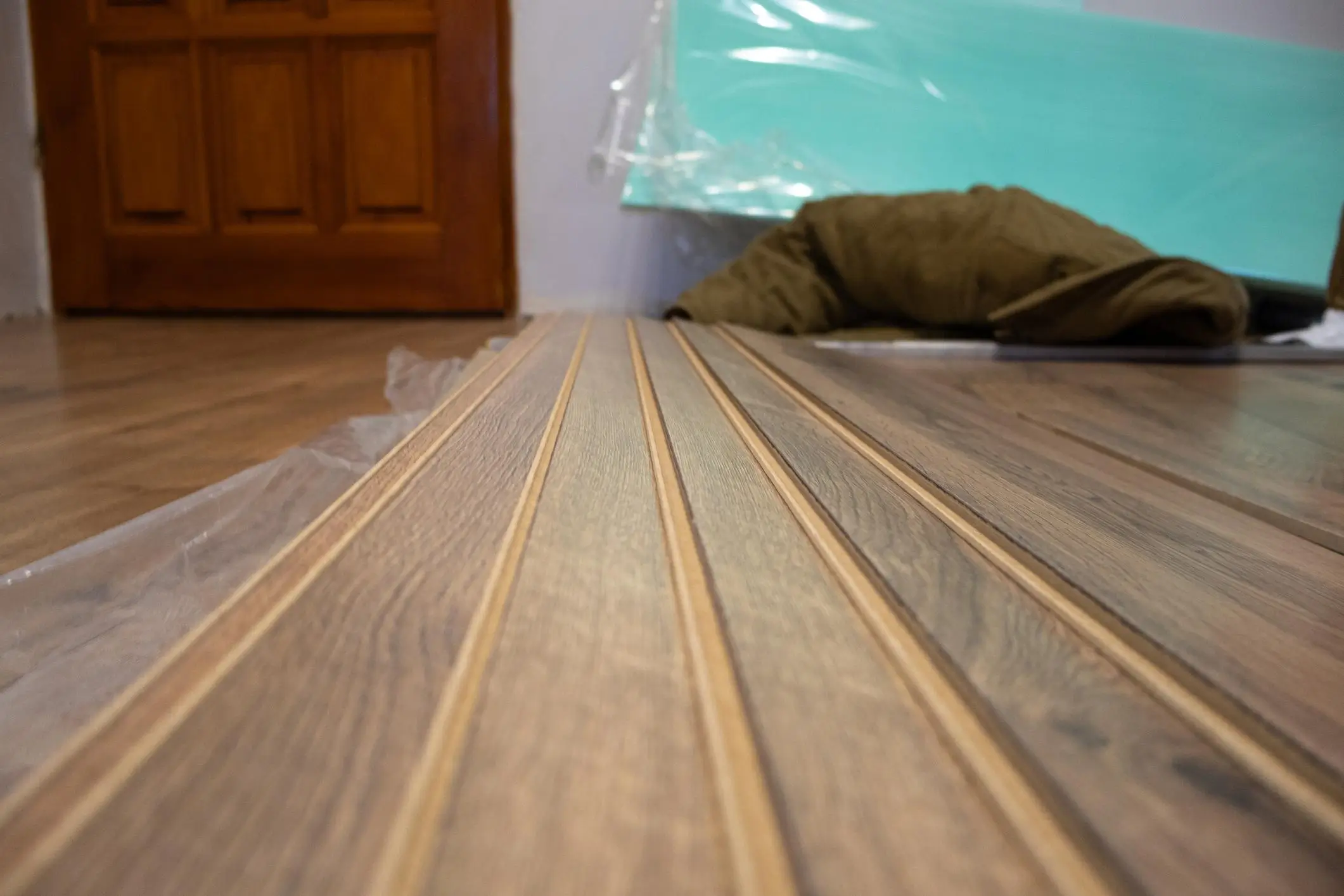 laminate flooring installation in Kenya with warm wood-look finish