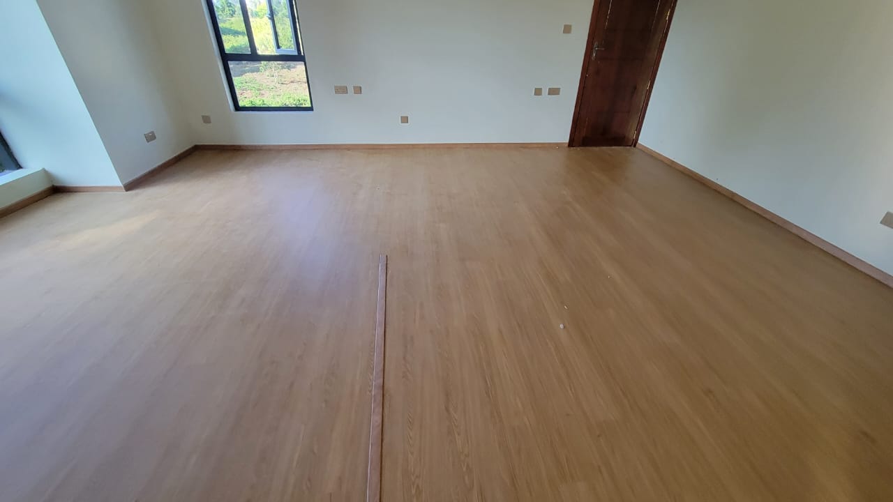SPC flooring installation and design as part of interior design services in Kenya